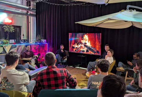 group of people at event in front of a fire place