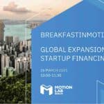 Entrepreneurs discussing startup financing & global expansion at BreakfastInMotion in Berlin
